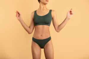 Woman with slim figure from liposuction in Dallas, TX