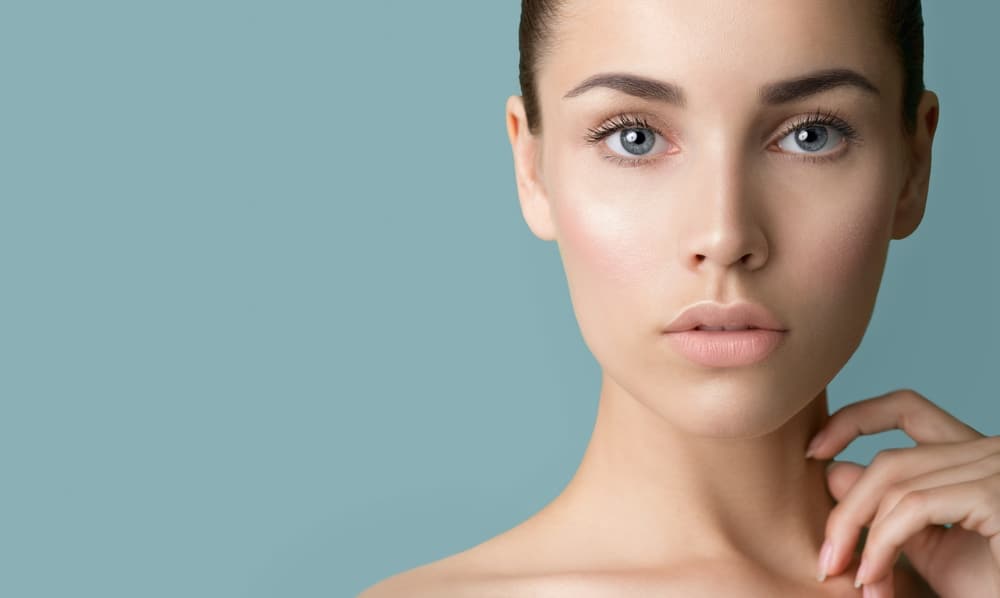 Woman with fresh skin from laser skin tightening in Dallas, TX