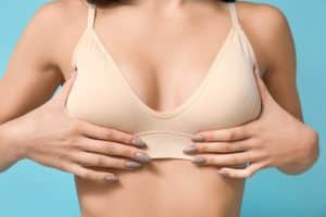 Woman in bra after breast lift in Dallas, TX